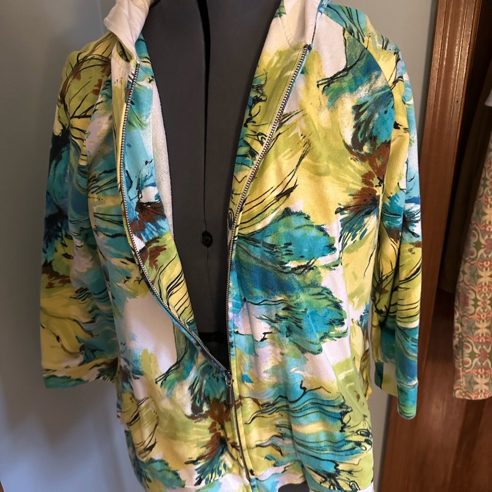 Zenergy 3/4 sleeve, zip up jacket. Blue and green floral design. Has pockets!